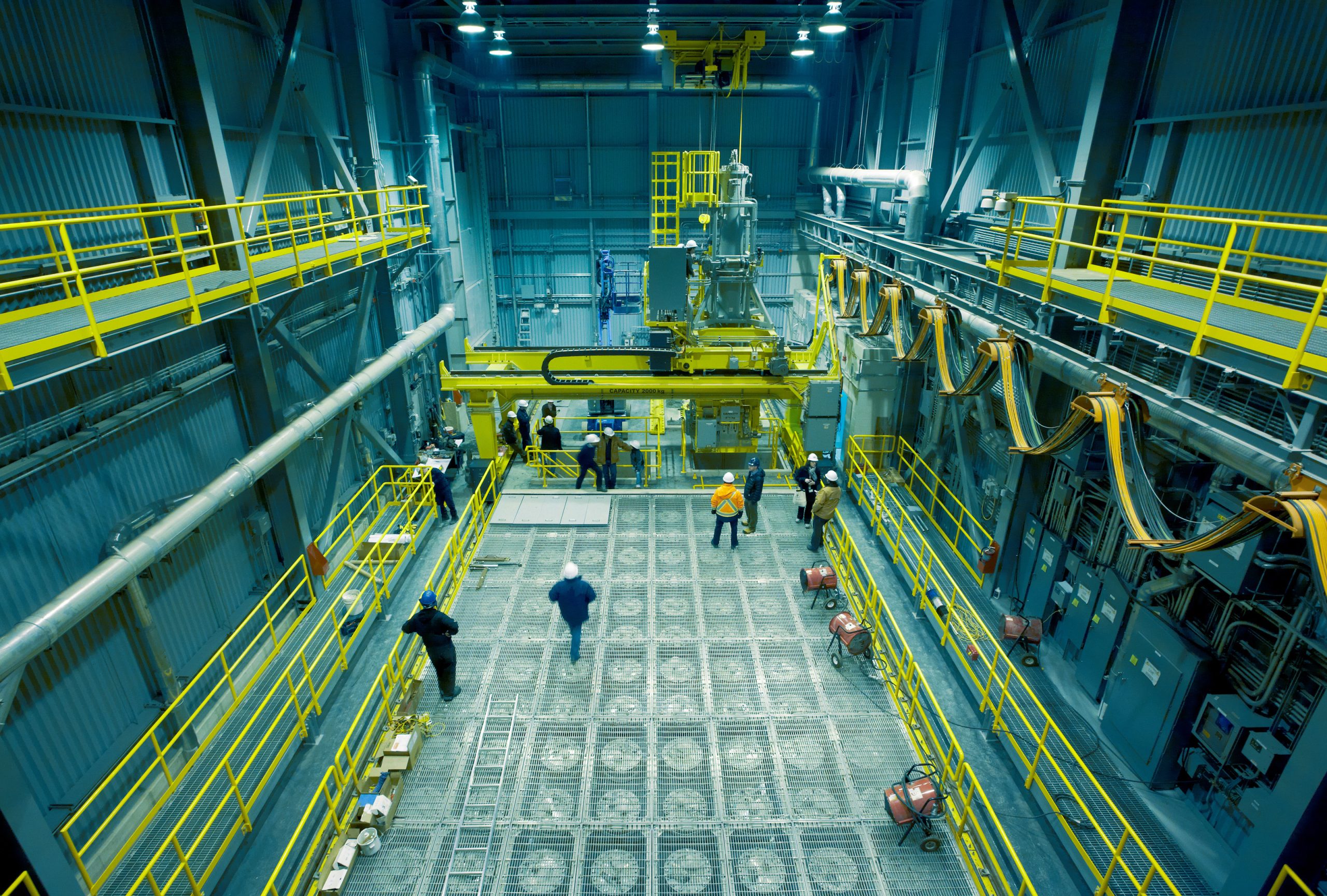 Workers in an isotope production facility.